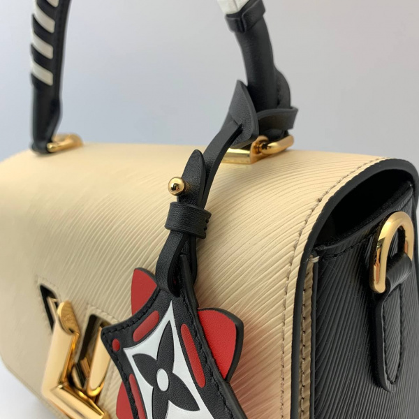 картинка Сумка Louis Vuitton Rafty Twist MM бежевая от магазина Papa Brandoff