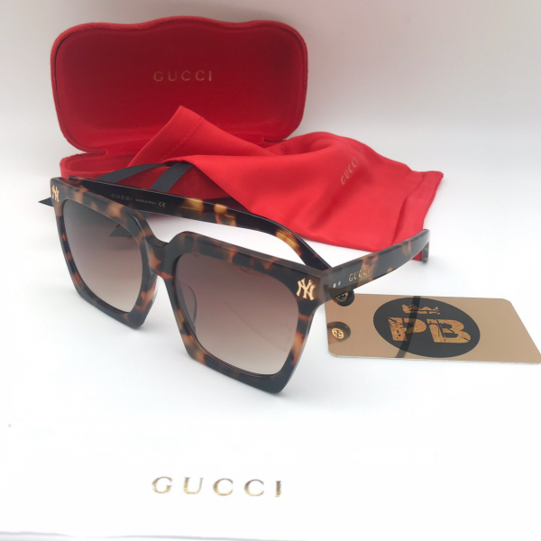 Gucci GG 0468 коричневый
